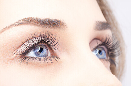 Woman with blue eyes close up