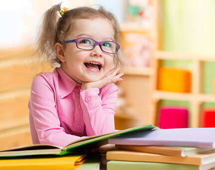 Young Girl In Reading Glasses