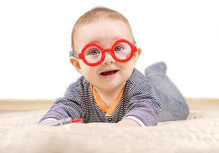 infant in glasses